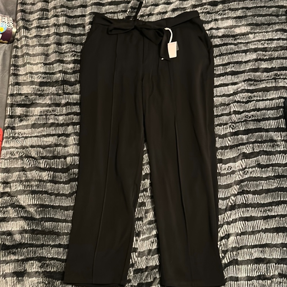 Black work pants with a front tie